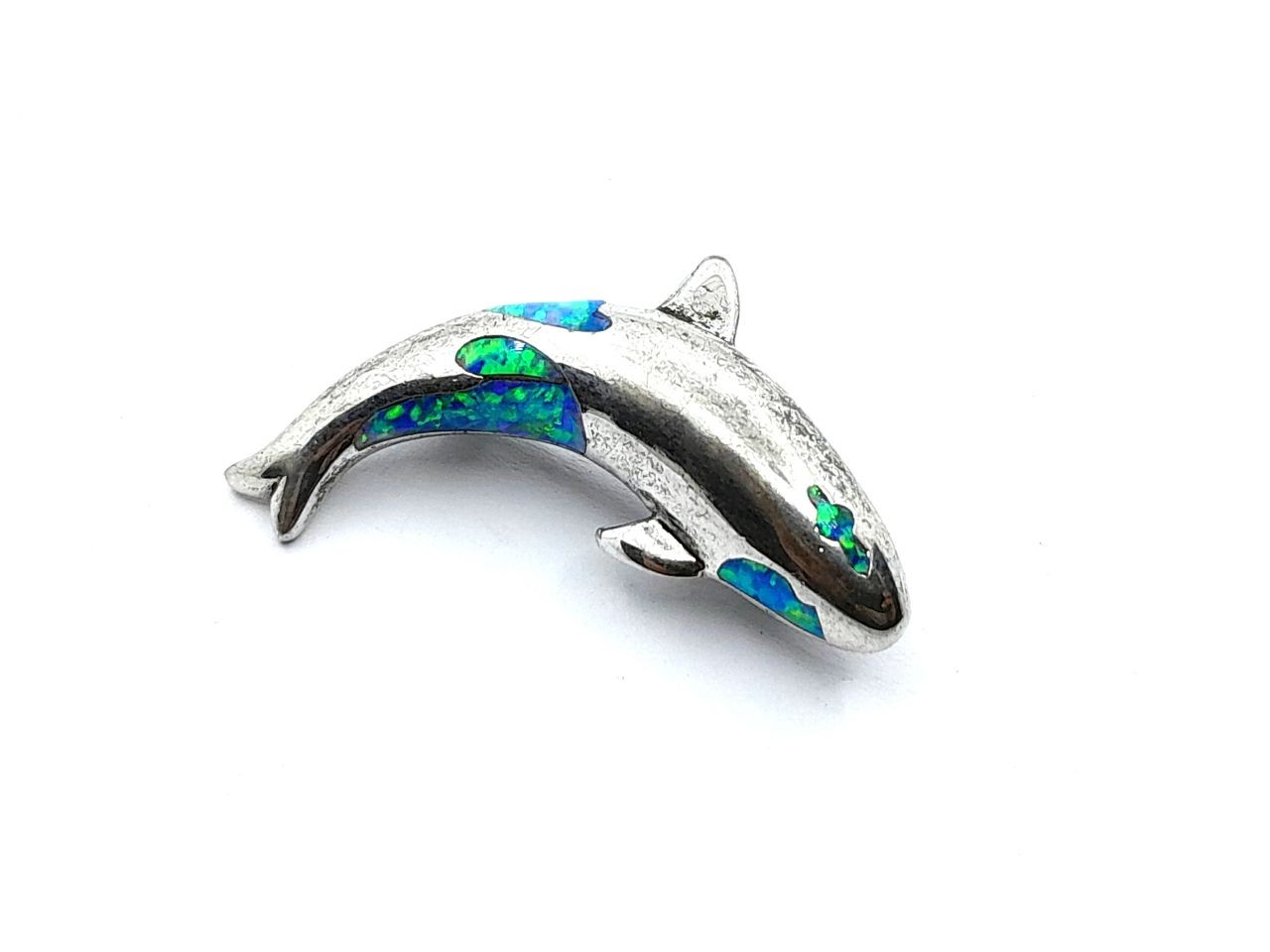 Silver dolphin brooch